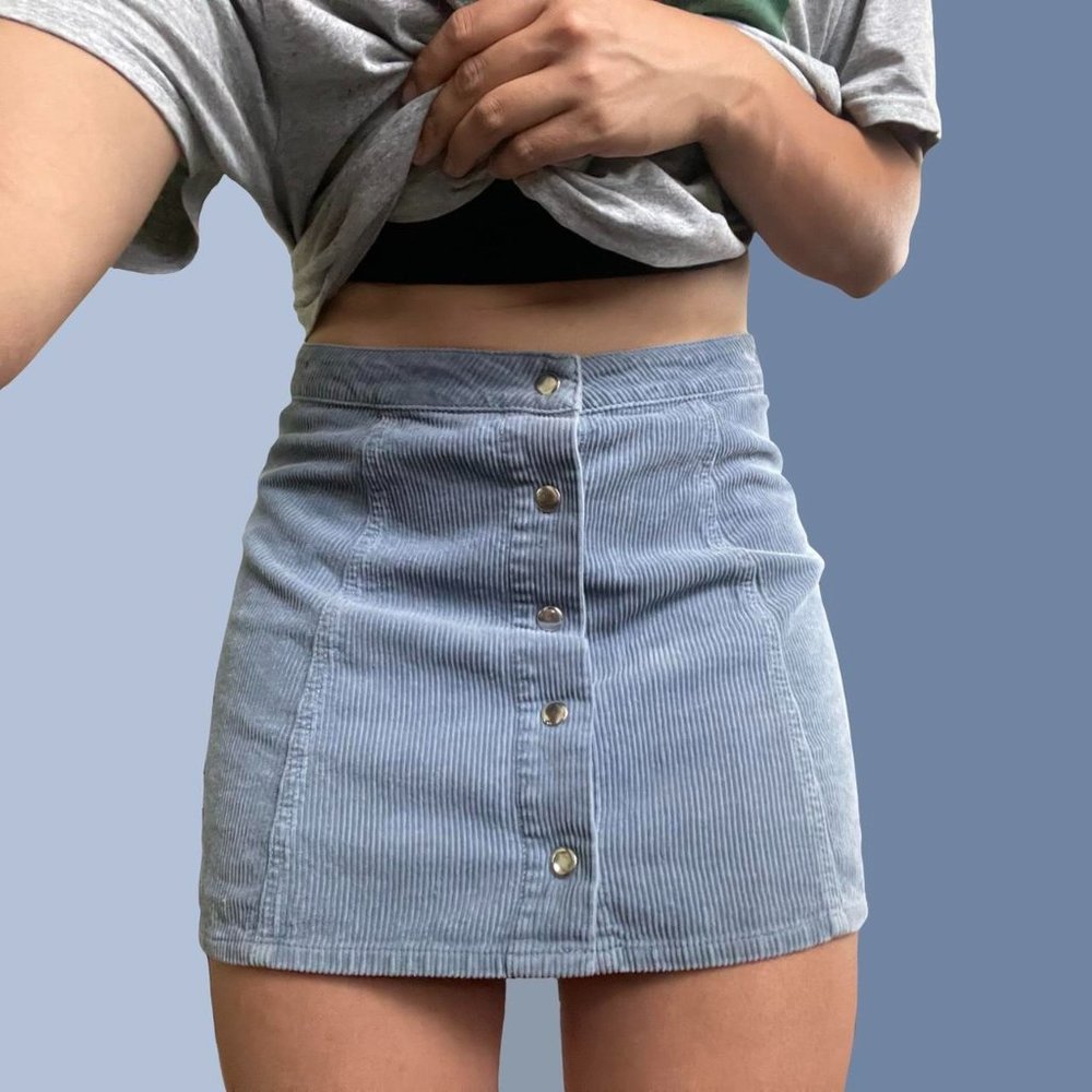 Light blue corduroy skirt with snap button closure